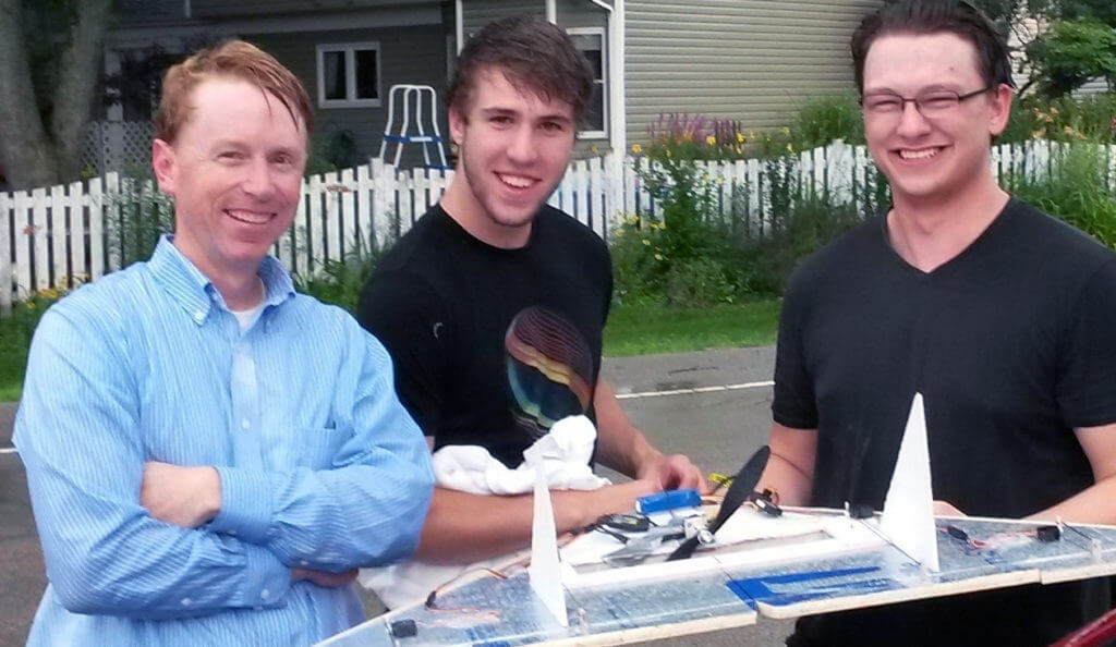 Professor Brianno Coller (left to right) with engineering students Kyle Bodie and David Frey