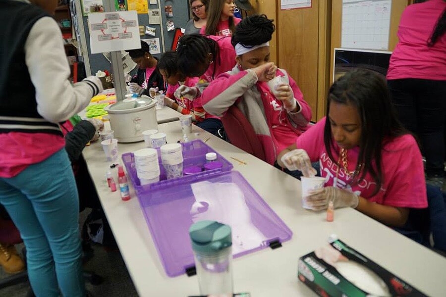 STEM Divas work on making lip gloss at an event in March 2015