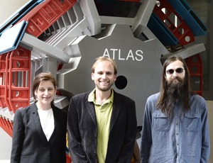 NIU postdoctoral student Nancy Andari (left) with professor Jahred Adelman (center) and Ph.D. student Blake Burghgrave at CERN.